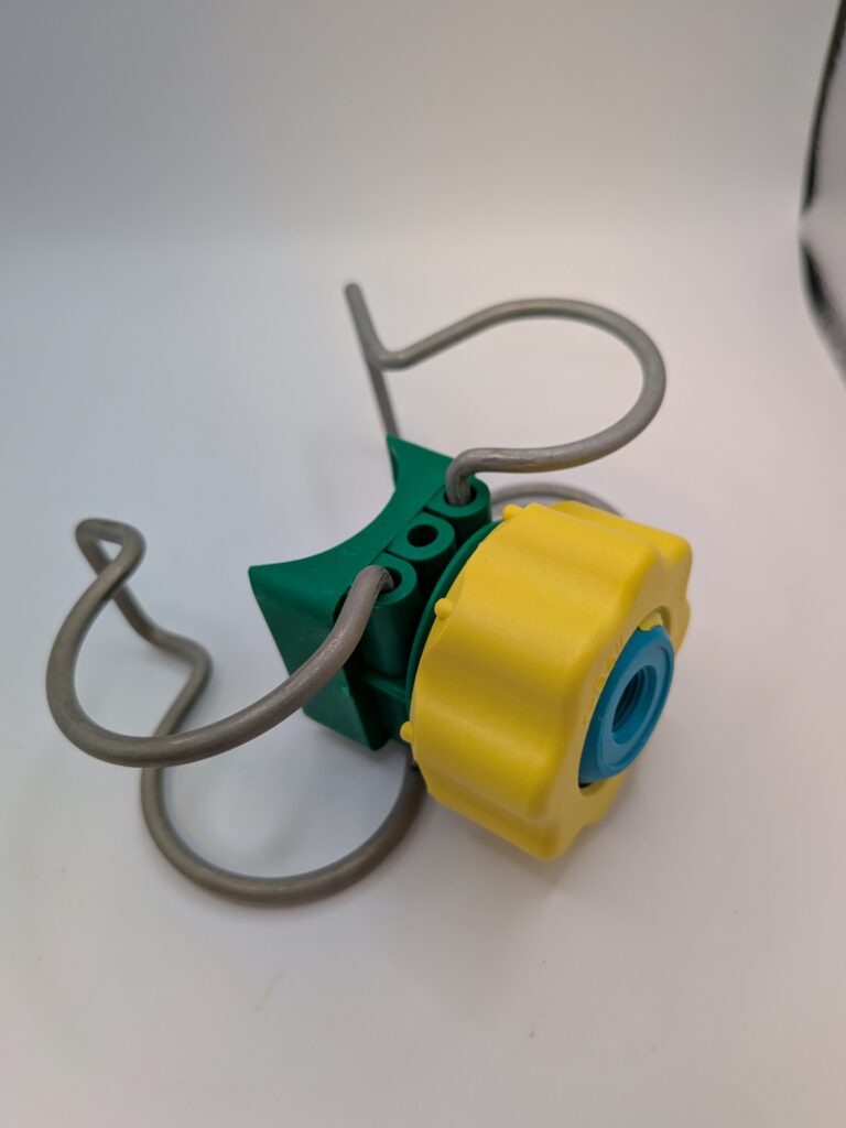 Clip-on base for spray nozzle